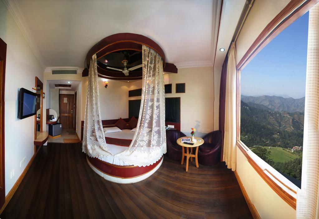 Hotel Landmark Shimla Quarto foto