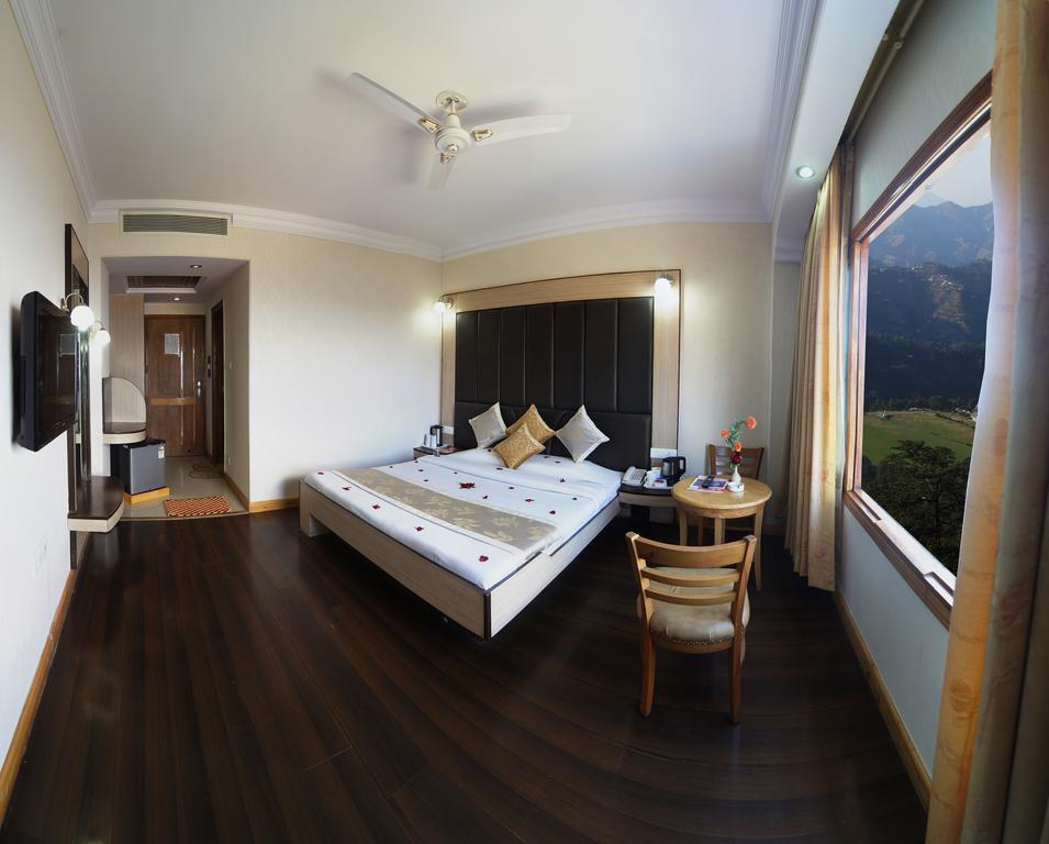 Hotel Landmark Shimla Quarto foto